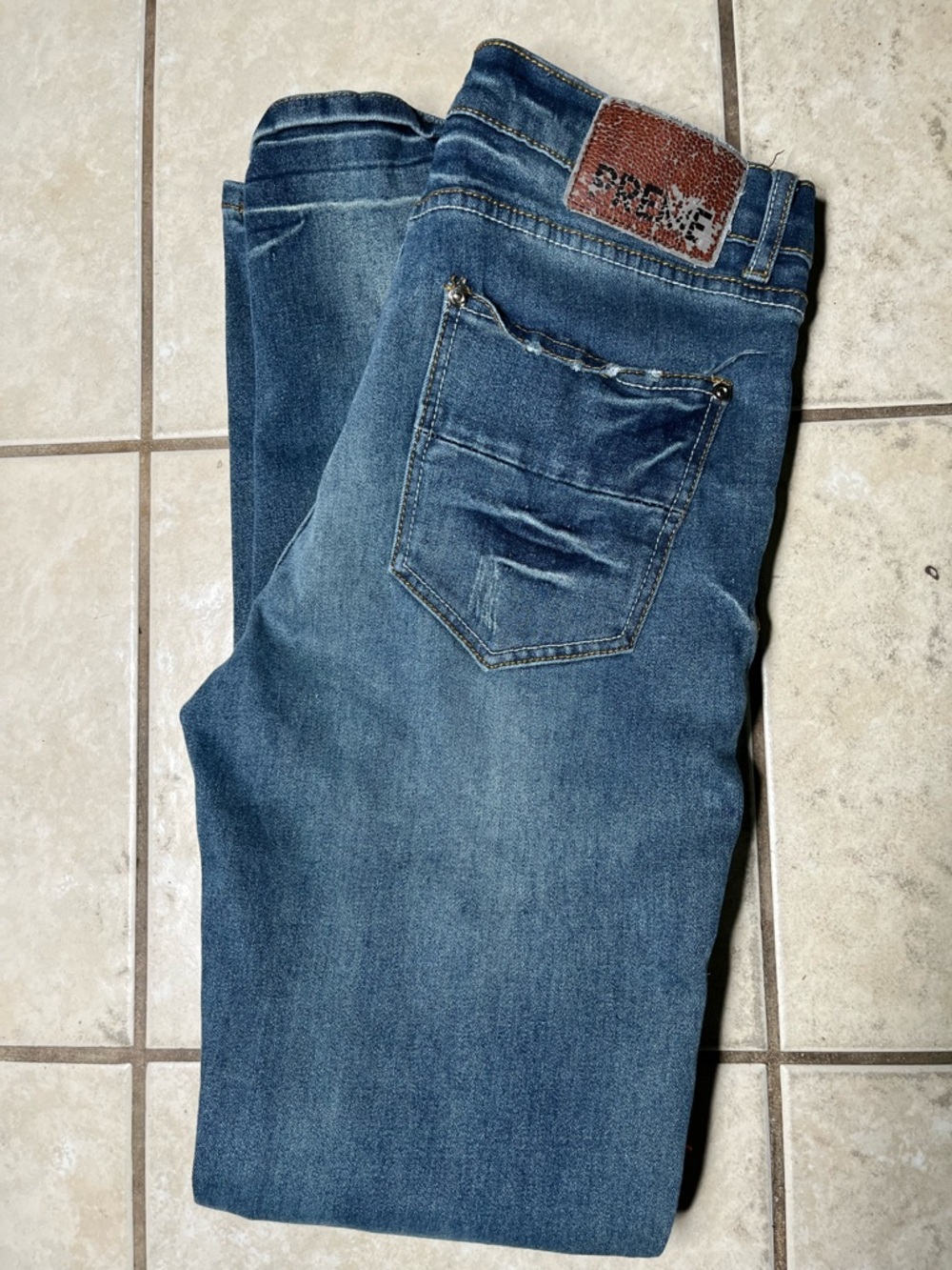 Slim Fit Men's Jeans in Distressed Blue Denim